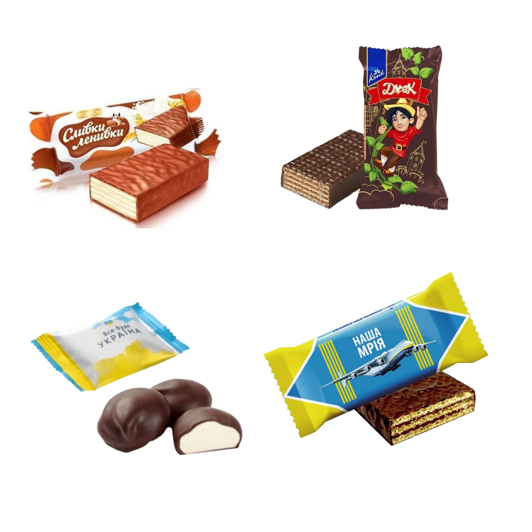 a variety of chocolates and candy bars on a white background