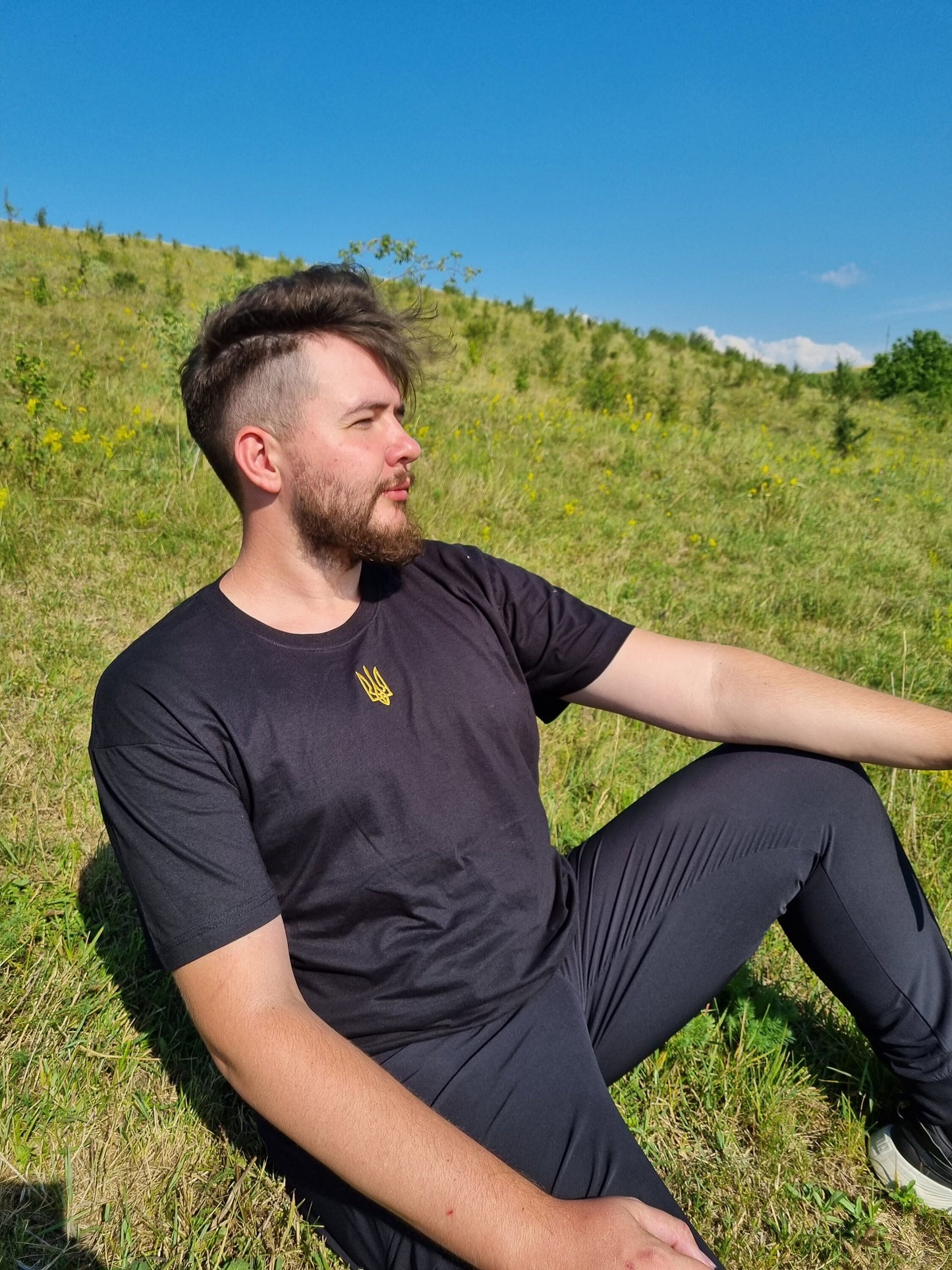 Black men's Ukrainian T-shirt with embroidery"This black Ukrainian T-shirt for men features beautiful embroidery and is made from high-quality materials for a comfortable fit. Available in various sizes.