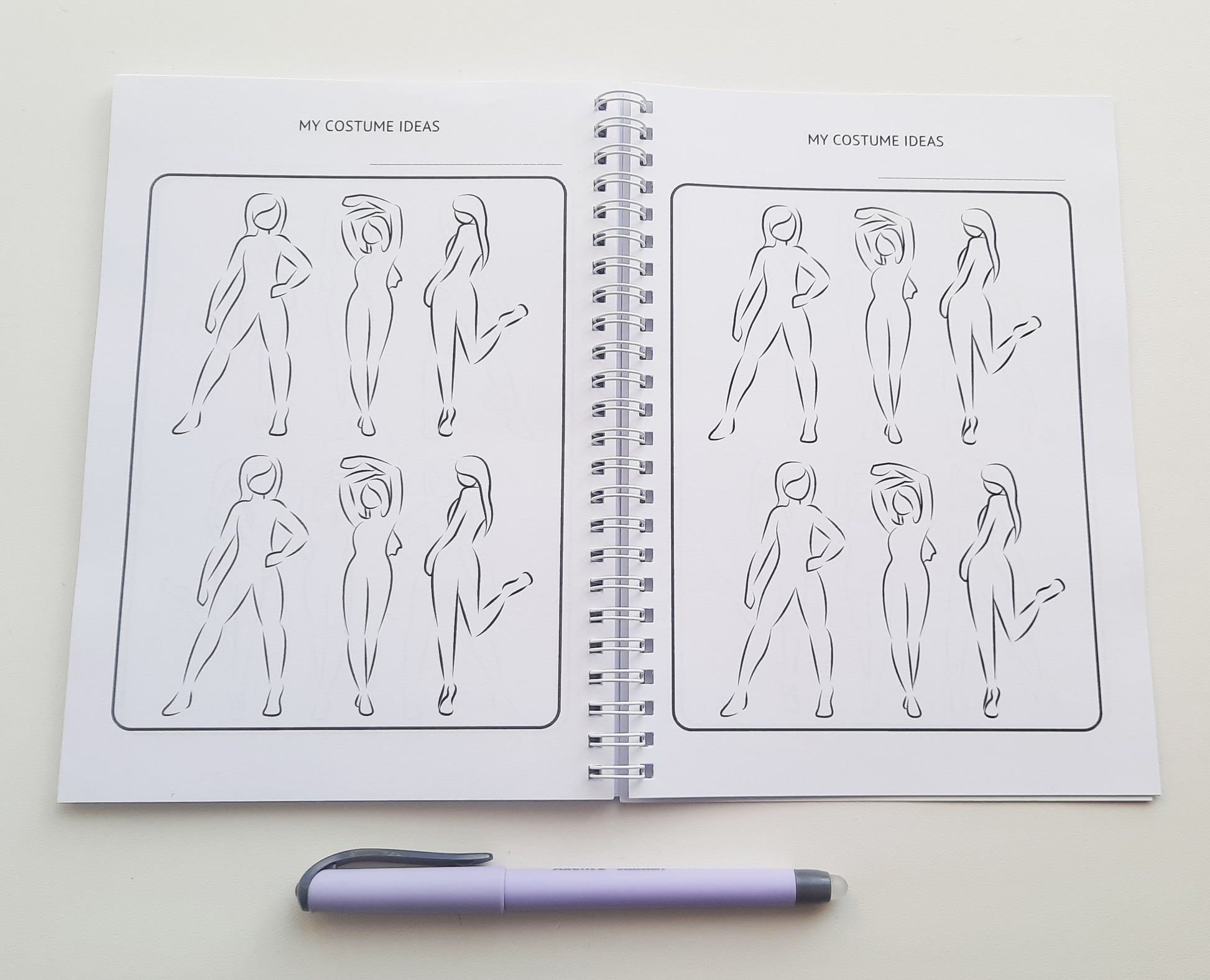 a notebook with a drawing of a woman's body