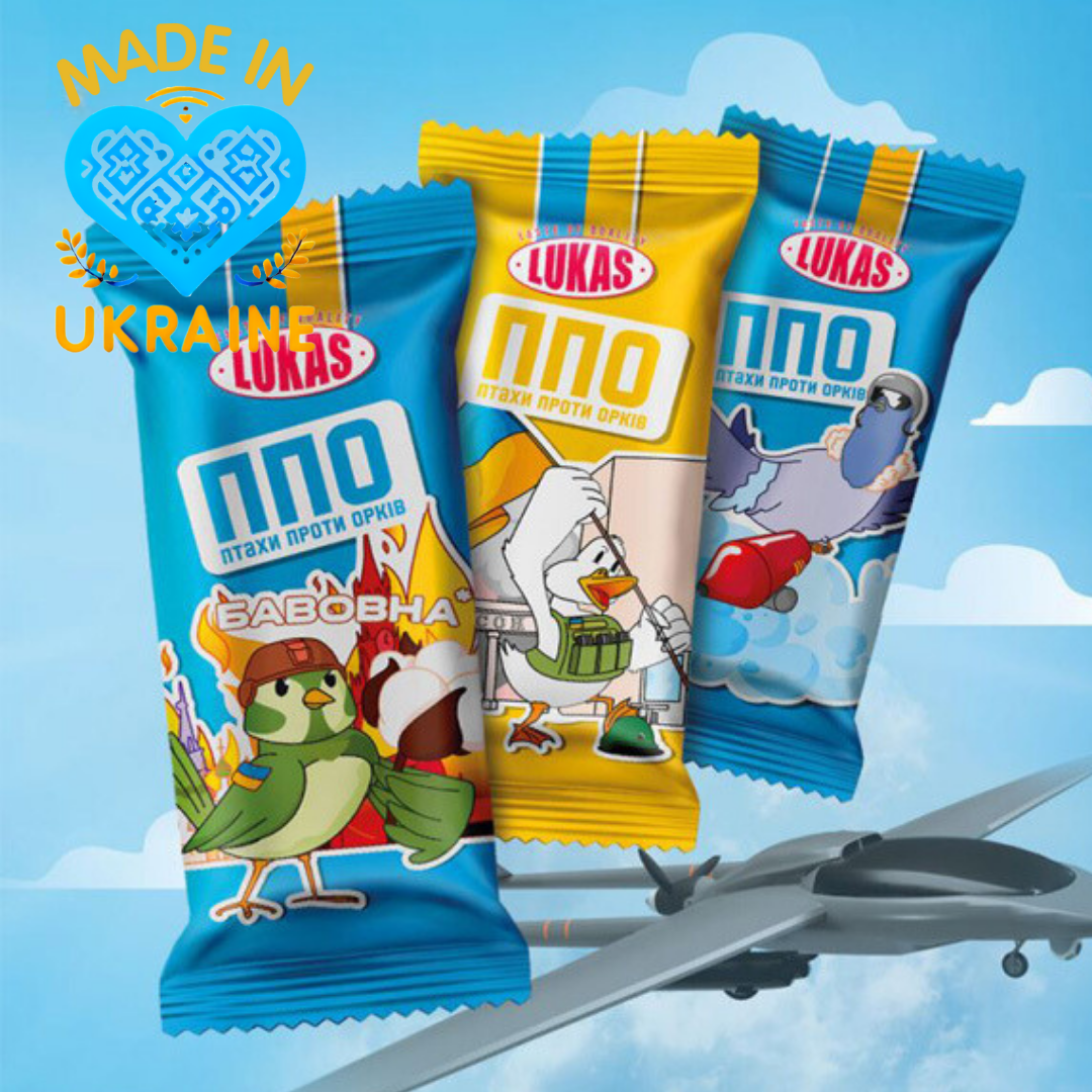 three bags of m & o on a blue background with an airplane in the background