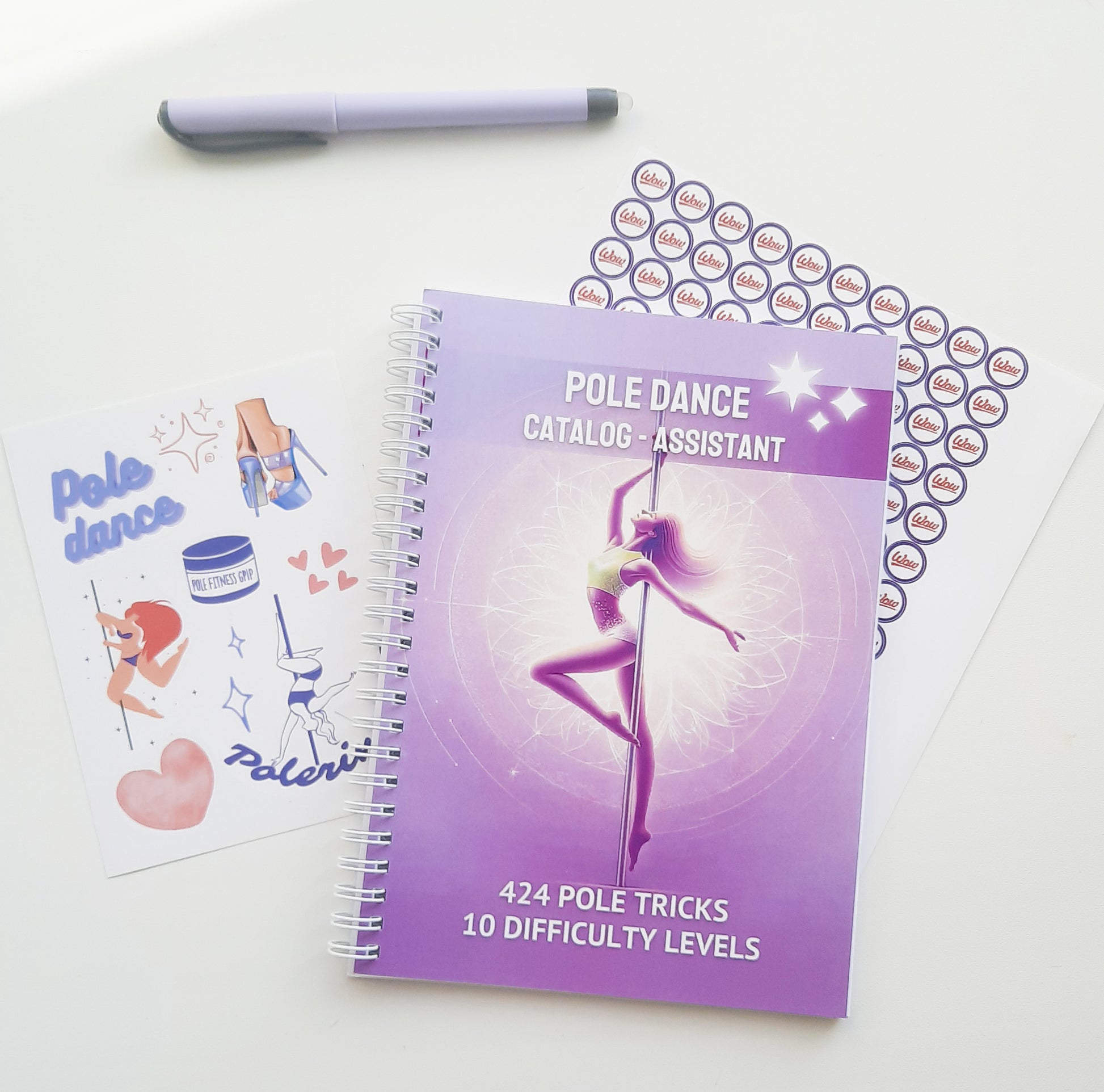 a notebook with a picture of a woman doing pole dancing