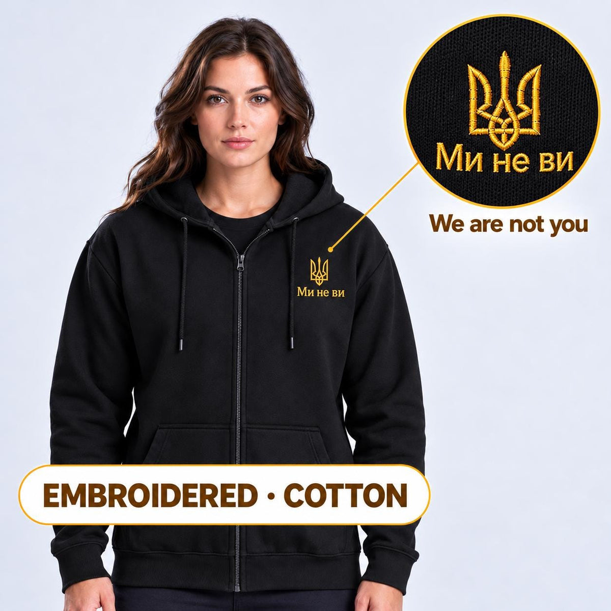 Women's Black Ukrainian Zip-Up Hoodie with Gold Tryzub Embroidery, “Ми не ви” Left Chest Design, 80/20 Cotton Blend, Mad