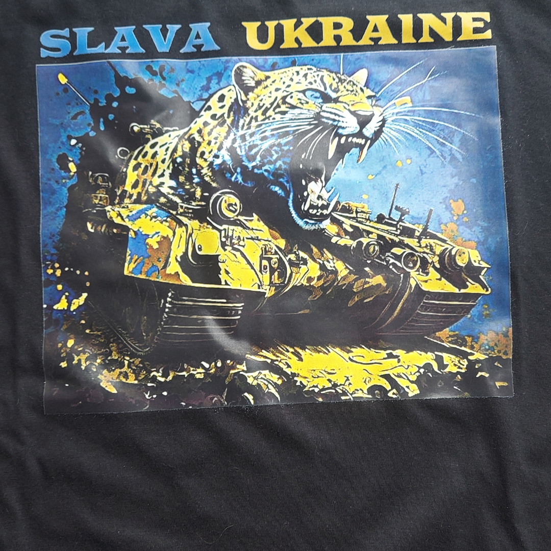 Reflect Ukraine's spirit with a Women Ukraine shirt, donning a bold leopard on a tank print in Ukrainian flag hues. Crafted by dedicated Ukraine Sellers, it's a symbol of unity and hope during unrest.