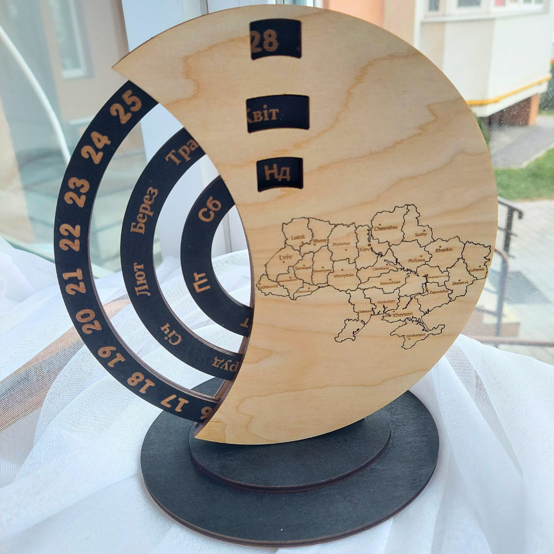 a wooden plate with a map of the world on it