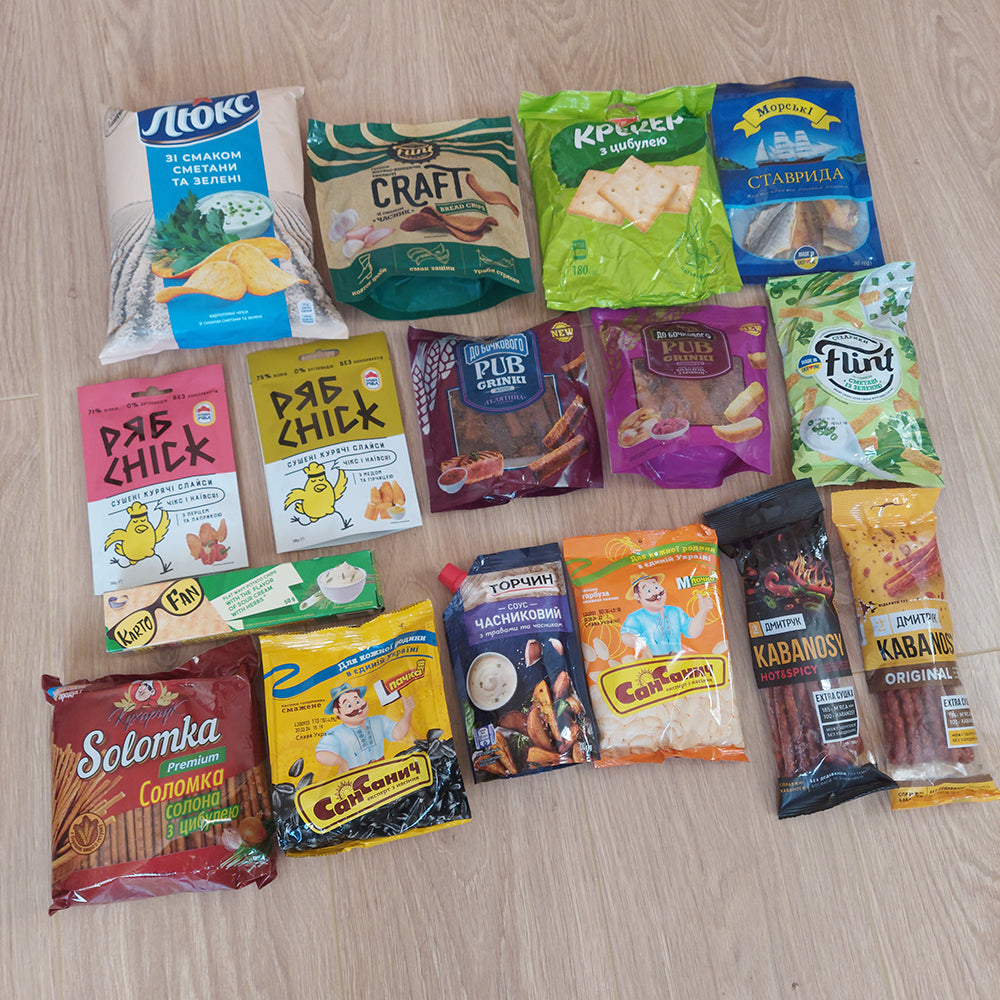 a variety of snacks laid out on the floor