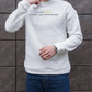 a man wearing a white sweatshirt with the words fight like librarians printed on it