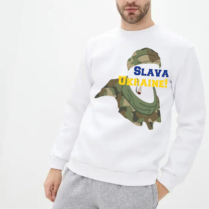 a man wearing a white sweatshirt with a camo print