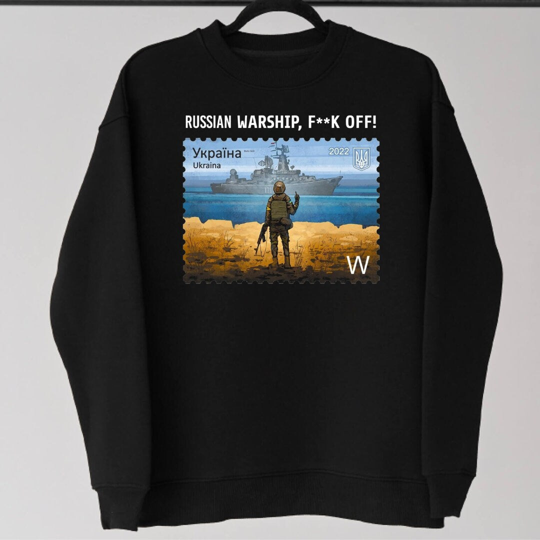 a black sweatshirt with a picture of a man on it