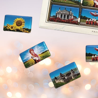 a bunch of pictures hanging from a string
