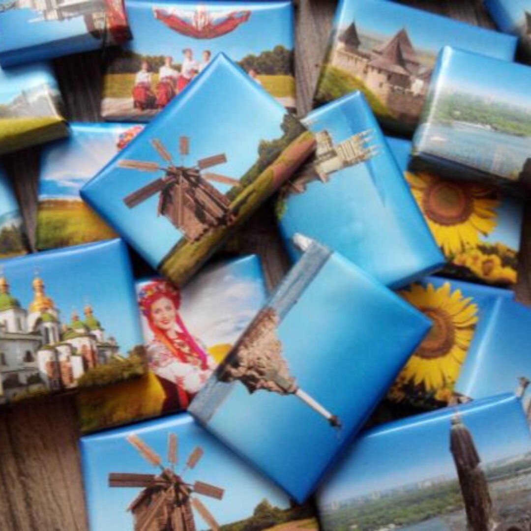 a bunch of pictures of windmills on a table