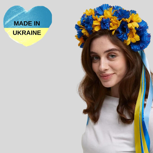 a woman with a blue and yellow flower crown on her head